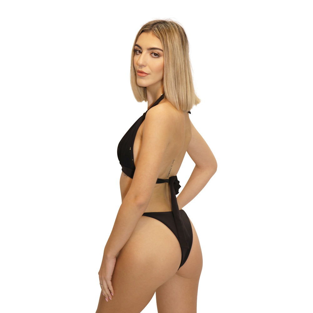 Woman wearing a Halter Neck Bikini top