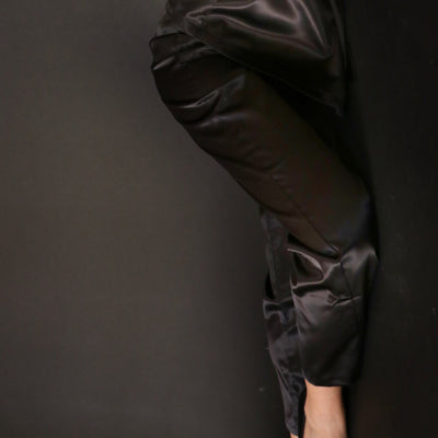 Pantaloni in raso di seta nero metallizzato